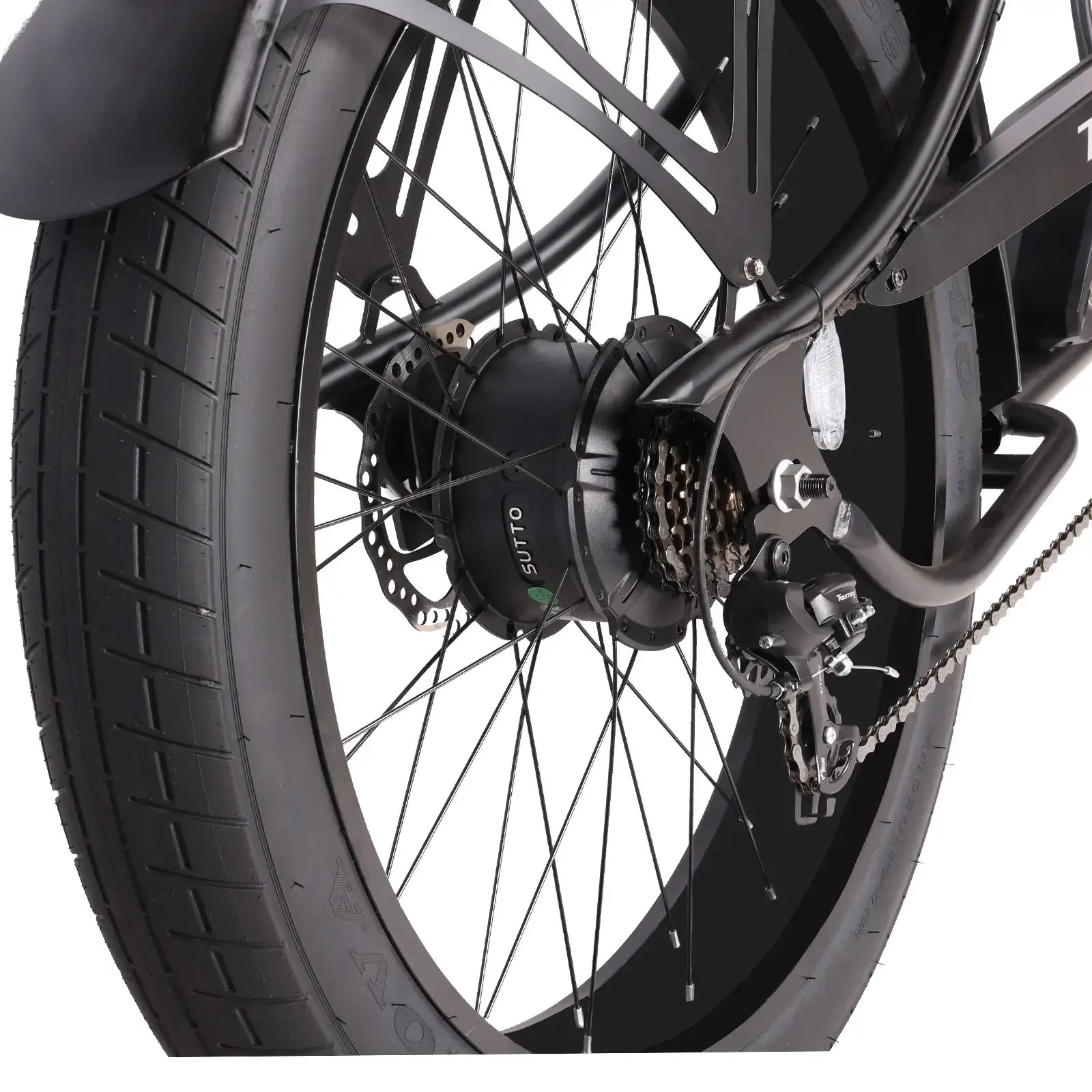 Close-up of the Chico GT7 750W Stretch Cruiser Ebike's rear wheel with fat tire and black rim.